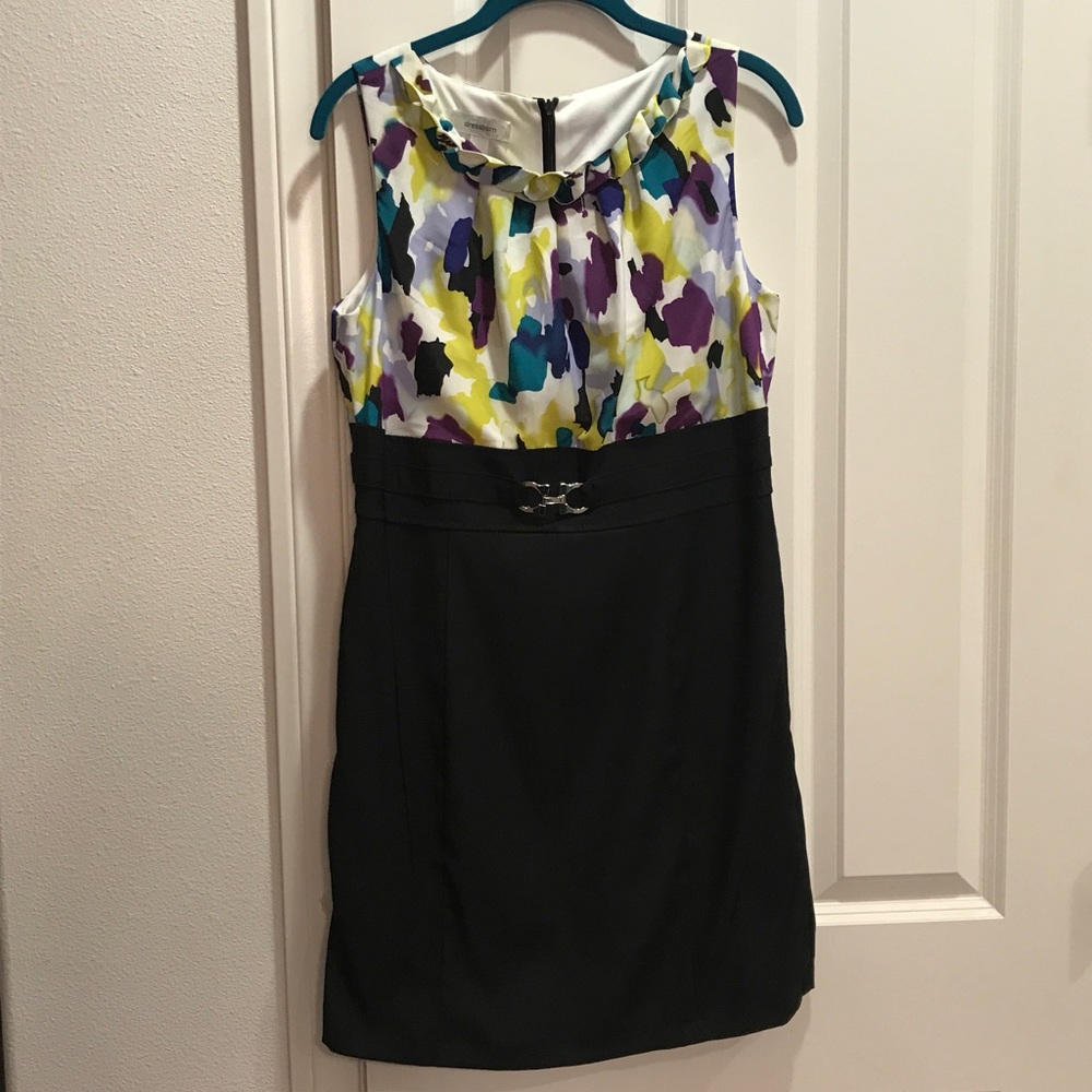 sleeveless black/multi. unique neck line dress